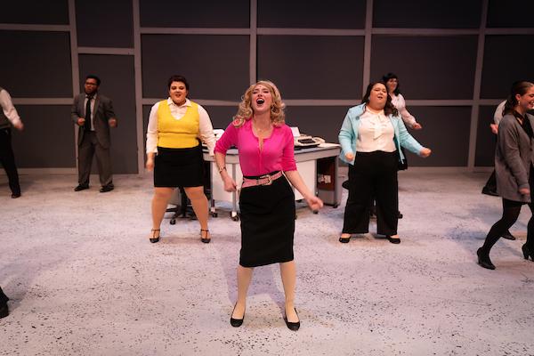 Students performing in 9 to 5